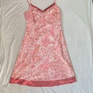 pink satin lined dress with adjustable straps and zipper in back